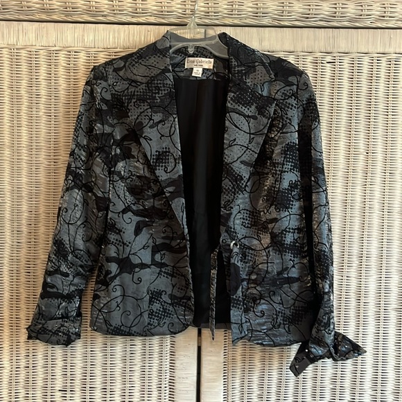 Beautiful silver and black jacket that has a tie at the waist. - Picture 1 of 3